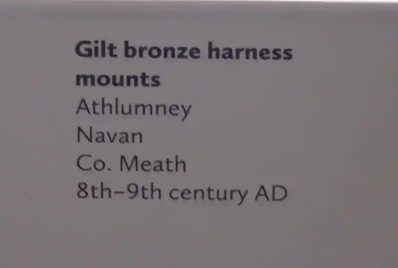 Harness mount in the shape of a cross with Celtic knots at the center